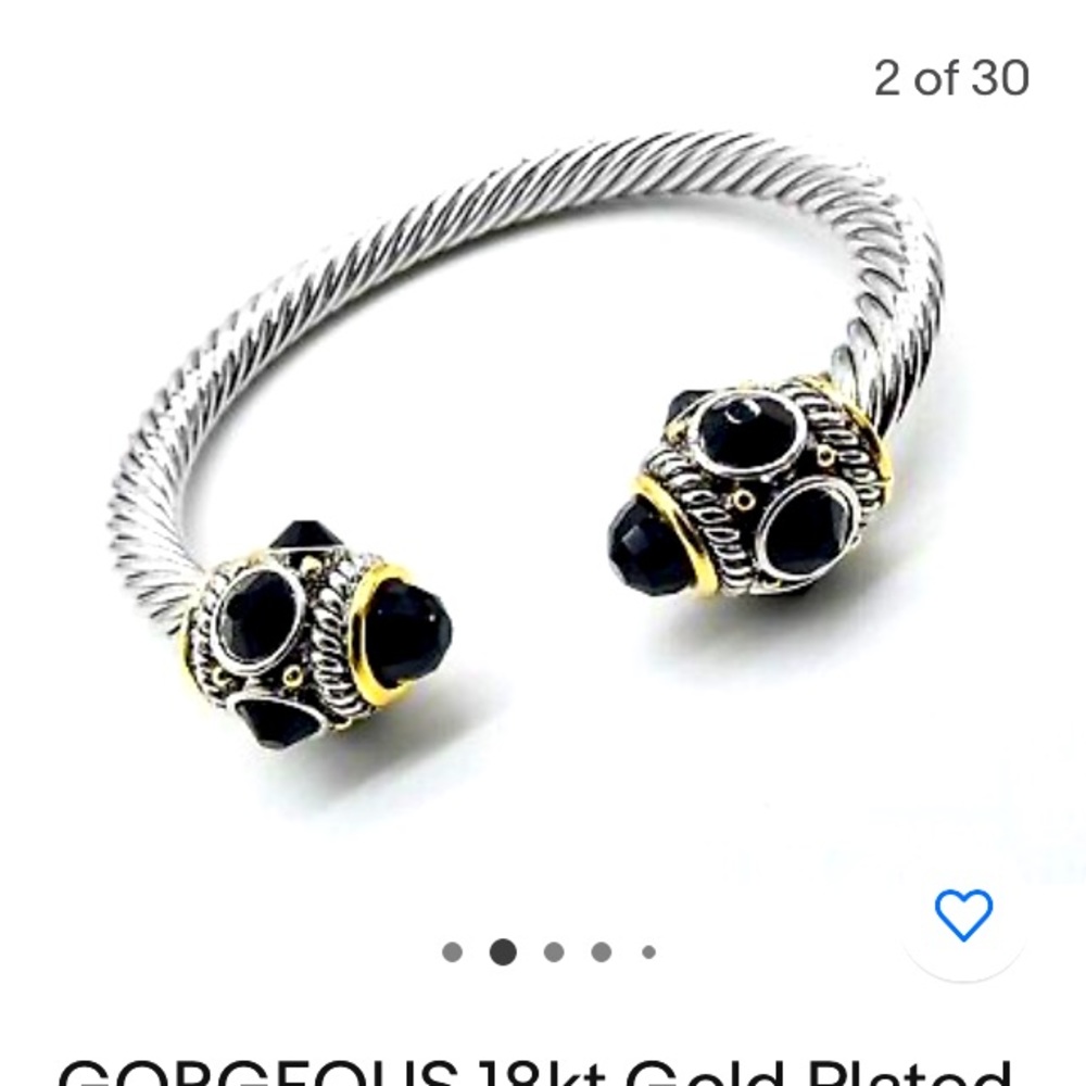 18k gold plated with black Crystal tips on a Silver cable bracelet cuff.